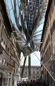 stunning solar roof rises over perugia italy tectonic architecture green architecture parasitic architecture