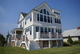 Classic cape cod cottage meets contemporary california beach house in this oceanfront home, which enjoys spectacular views across chatham harbor. New England Beach House Houzz