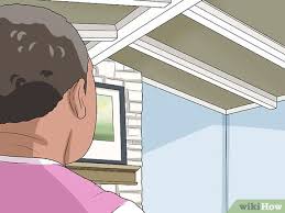 The easiest way to paint tall walls inspiration for moms. How To Paint Vaulted Ceilings With Pictures Wikihow