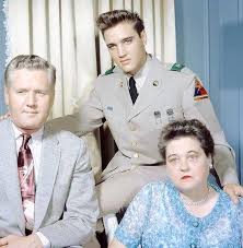 Cat ch it while you can!! Elvis With His Parents Vernon And Gladys Presley In 1958 Oldschoolcool