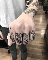 Floral Knuckle Tattoos By Annita Maslov Knuckle Tattoos Knuckle Tattoo Finger Tattoos