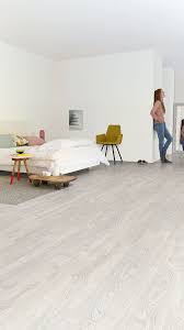 How To Find The Bedroom Flooring Of Your Dreams Bedroom Laminate Flooring Bedroom Flooring Grey Laminate Flooring