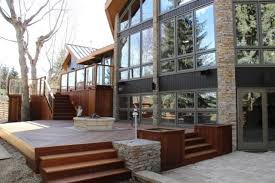 Hanging baskets and decorative planters also enhance the visual appeal of a home or office. Exotic Decking Stairs Planters And Railing Tropical Deck Calgary By Kayu Canada Inc Houzz