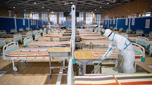 Background is a pretty blue. As You Get Older The Physical Stuff Is Hard Meet The Hospital Cleaner On The Frontlines Of The Coronavirus Pandemic Marketwatch