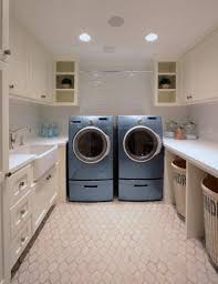 Laundry Room White Quartz Countertops And Subway Tiled Backsplash Atop An Arabesque Tile Floor Over Laundry Room Layouts Laundry Mud Room Laundry Room Design