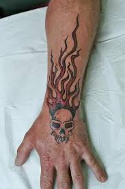 The above fire tattoo is a nice and simple piece done in all black. Skull Flame Tattoo Ink Fire Flame Tattoos Tattoo Designs Tattoo Styles