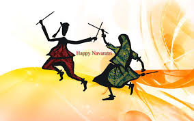 Dandiya is exactly called as dandiya raas. Happy Navratri Couple Playing Dandiya