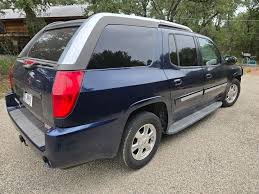 Image result for Superior Blue 2004 Envoy