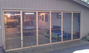 Sliding screen doors sliding door hardware sliding barn door hardware door hinges diy sliding door cheap barn door hardware hanging sliding doors for the hardware he bought: Bug Proofed The Hobby Garage Six Doors From Menards Each Cost Fifteen Dollars Total Project With Hinges Garage Screen Door Bedroom Door Design Diy Basement