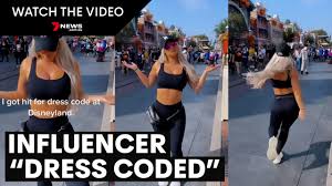 Fitness influencer dress coded at Disneyland for wearing active wear