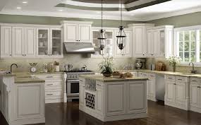 White ice granite countertops for a fantastic kitchen decor. Charleston Antique White 5day Cabinets All Wood Kitchen Cabinets Sales Installation Granite