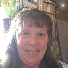 Who is the owner of the tan and white mixed breed dog in Brady Lake, Ohio?