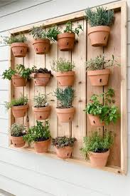 She used an old pallet and empty paint buckets to make a simple and cheap vertical garden for her yard. 32 Best Diy Herb Garden Ideas Tutorials Crazy Laura
