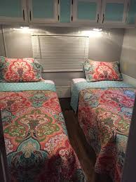Removed Queen Size Bed And Replaced With Twin Platform Beds For Added Storage Also Replaced Old Carpet With Glamper Camper Remodeled Campers Camper Makeover