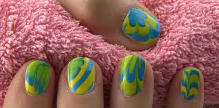 Place nail into the water (nail down onto the design.) leave the nail in the water for several seconds. Water Marble Nail Art 13 Steps With Pictures Instructables