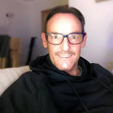 Travelling to Philly in December, question do I buy my Pesos now or when I  get thier ?? I don't know about the rate of it will go up or just do