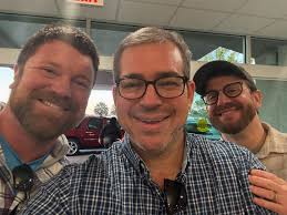 New hoodie arrived. Daughters legs for scale. Thanks #phillipdefranco