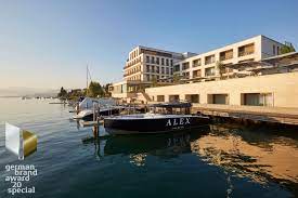 opened in july 2019 the boutique hotel impresses with its fine design and top location directly by lake zur architecture conceptual architecture hotels design
