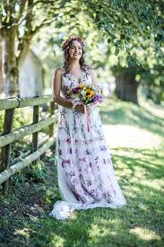 We love the ditsy pastels on this charlotte balbier wedding dress. A 3d Floral Temperley Dress For A Colourful Outdoor Scottish Wedding Love My Dress Uk Wedding Blog Wedding Directory