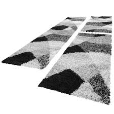 Geflochtene fransen zieren die beiden breitseiten. Lauferset Shaggy In Schwarz Weiss Und Grau Teppich De