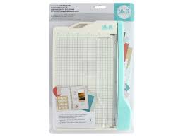 There are various sizes of cutting mats in the craft supply stores. We R Memory Keepers Mini Guillotine Paper Cutter Createforless
