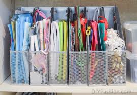 I did add additional hanging baskets on the sides for bigger items like gift bags and tissue paper, but much easier to use. Diy Gift Wrap Organizer Ikea Hack Diy Passion