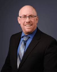 Commissioner Jason Wunsch