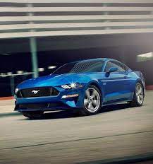View Of 2018 Mustang Gt Premium In Kona Blue Seen On The Street Blue Mustang Ford Mustang Mustang