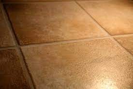 Apply the solution on the soap scum spots and allow some time for the mixture to be absorbed. How To Clean Rough Tile Floors Hunker Cleaning Ceramic Tiles Ceramic Floor Tile Painting Ceramic Tile Floor