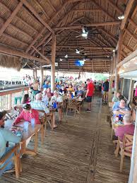 Salty Donkeys at Rock Landing was kicking a.. tonight. Very clean  restaurant great food and atmosphere with the huge cooling fans. Oh and the  raw oysters were salty and fantastic. The new