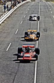 01 henri pescarolo march 701 ford leads jackie pretorius brabham bt26a ford and howden ganley brm p153 02 dave charlton ford vintage racing race cars henri pescarolo march 701 ford leads