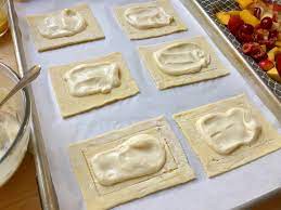 Puff pastry is a light, flaky and tender pastry made by mixing flour, water and salt there are many ways of making puff pastry. Stone Fruit Cream Cheese Puff Pastry Recipe Sinkology