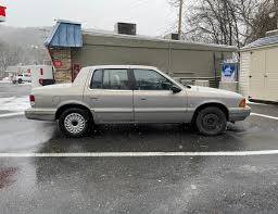 Image result for Medium Driftwood 1993 Chrysler