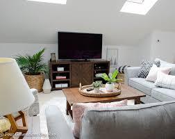 Sloped walls offer a burst of charm and character to any room. My Lady Loft Living Room With Sloped Ceiling Four Generations One Roof