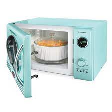 Of critical importance to microwave cooking is accurate timing. Nostalgia Retro 800 Watt Countertop Microwave Oven Aqua 0 9 Cu Ft 082677000170 Rona