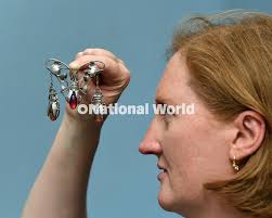 39935478-Harriet Hunter-Smart at Tennants Auctioneers with the Omega 18  Carat Gold Limited Edition Chronograph Wristwatch To Commemorate the Apollo  XI Moon Landing for sale at the Fine Jewellery, Wat