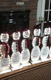 Wooden Snowmen With Light Wooden Snowman Crafts Christmas Crafts Christmas Crafts Diy
