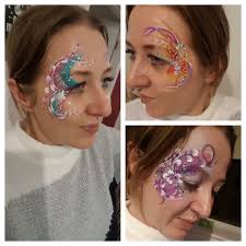 Is there anybody over here that does glitter face art?