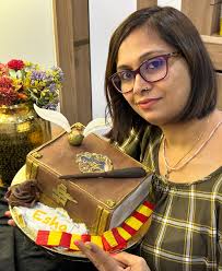 Hey, book lovers! Behold, the magical Harry Potter book cake, crafted with  meticulous detail to transport you to Hogwarts! Don't miss the intricate  details that bring this edible masterpiece to life Golden