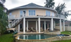 Why These Round Houses Survive Hurricanes That Destroy Traditional Homes Beach House Design Round House House On Stilts