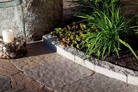 Imitate the fencing around your yard and make a tiny version for just your garden. 9 Amazing And Affordable Landscape Edging Ideas