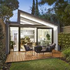 Domain Australia On Instagram Cute And Cool This Modern Extension S Sloping Roof Is Clever In The Way It Maximis Modern Extension Small Summer House Pergola