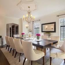 Black Dining Table With Cream Upholstered Dining Chairs Teppich Unter Esstisch Esszimmertisch Speisezimmereinrichtung