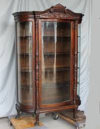 This transitional curved glass curio cabinet features four curved front glass doors with nickel finished hardware. Nexera 200317 Elegance 60in Curio Cabinet Lowe U002639 S Canada The Ideas Of Living Room
