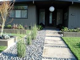 Going from a mismatched theme to more modern look, using the same paver stones and creating straight lines throughout beds. Pin By Taylor Lee On For The Home Modern Landscaping Modern Front Yard Modern Front Yard Landscaping