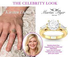 One Look At Kirsten Dunst S Engagement Ring Will Tell You That Yellow Gold Has Still Got It Martin Flyer Engagement Ring Engagement Rings Engagement