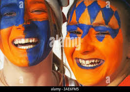 Mar 27, 2005; Peoria , IL, USA; Flora cheerleaders Kendra Briscoe, 17,  left, Nicole Henderson, 17, center, and Laura Hettiger, inverted in a  somersault, twisted, yelled and cheered for Flora High School