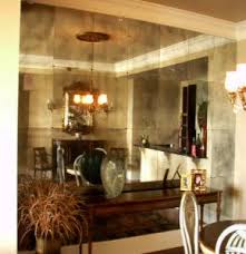 This will remove flecks of paint and help to create the mercury glass look of the mirror. My Crush On Antique Glass Mirrors The Detail And The Design Mirror Wall Living Room Mirror Wall Mirror Design Wall