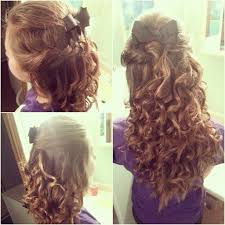 Curly Hair With A Swisted Bump Fishtail Braid On The Other Side Coming To Together Bow In The Middle Back Curls On C Bump Hairstyles Hair Curly Hair Styles