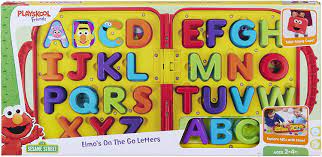 Letters is a educational game developed by children's television workshop and published by learning company in 1998. Amazon Com Sesame Street Elmo S On The Go Letters 24 X 36 Inch Toys Games